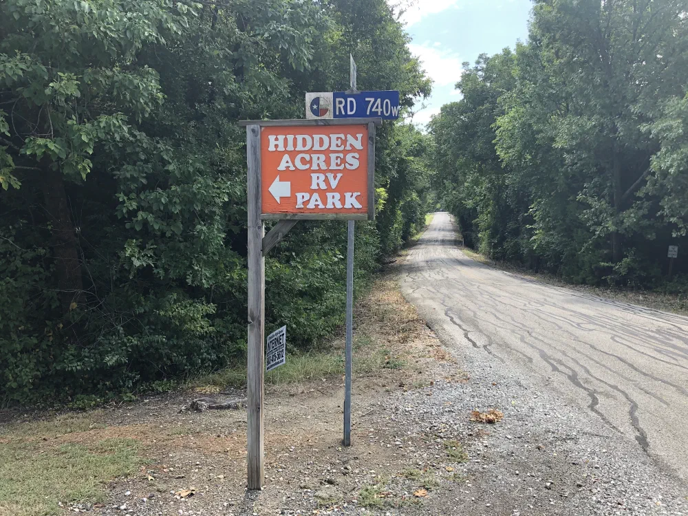 Hidden Acres entrance sign on County Road 740